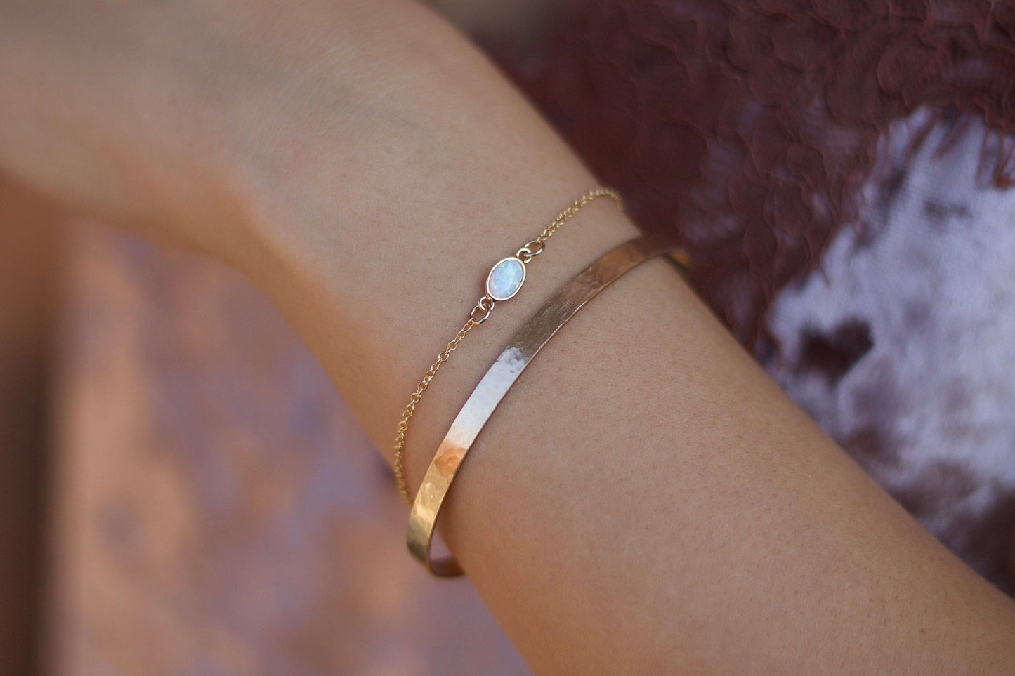 Dainty opal bracelet featuring genuine white fire opal stones with our layered cuff sold separately on a 14K gold-filled chain, perfect for everyday wear and water-friendly.