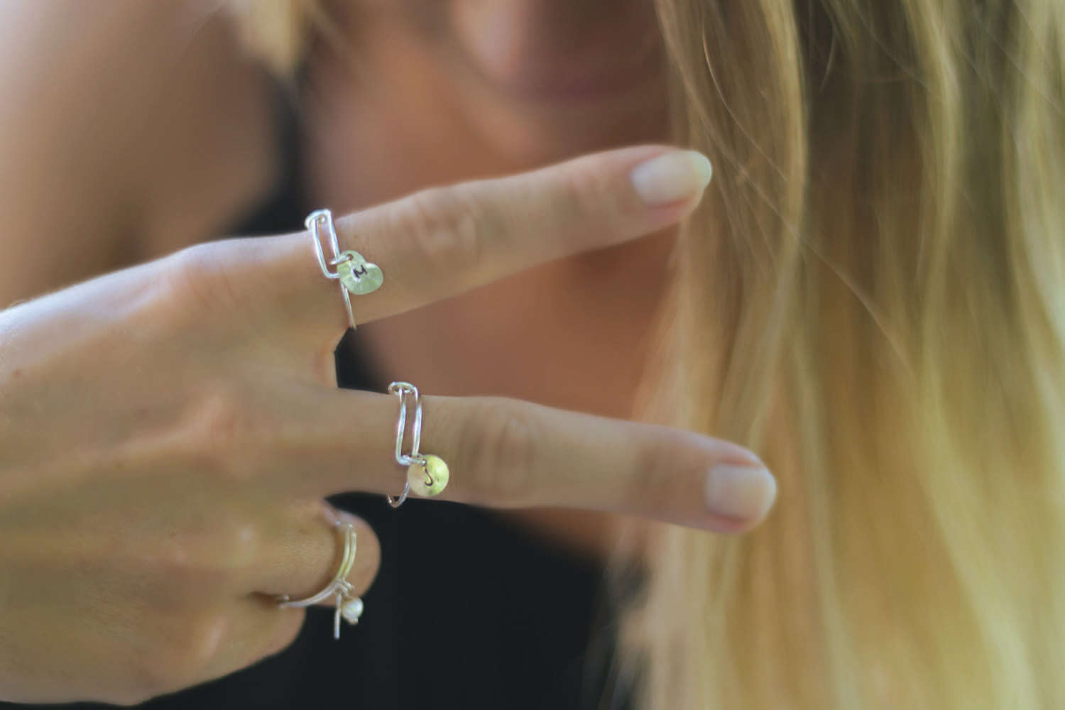 L.A.Osborn Adjustable Personalized Silver Charm Ring  Stacked on three fingers to show stacking looks