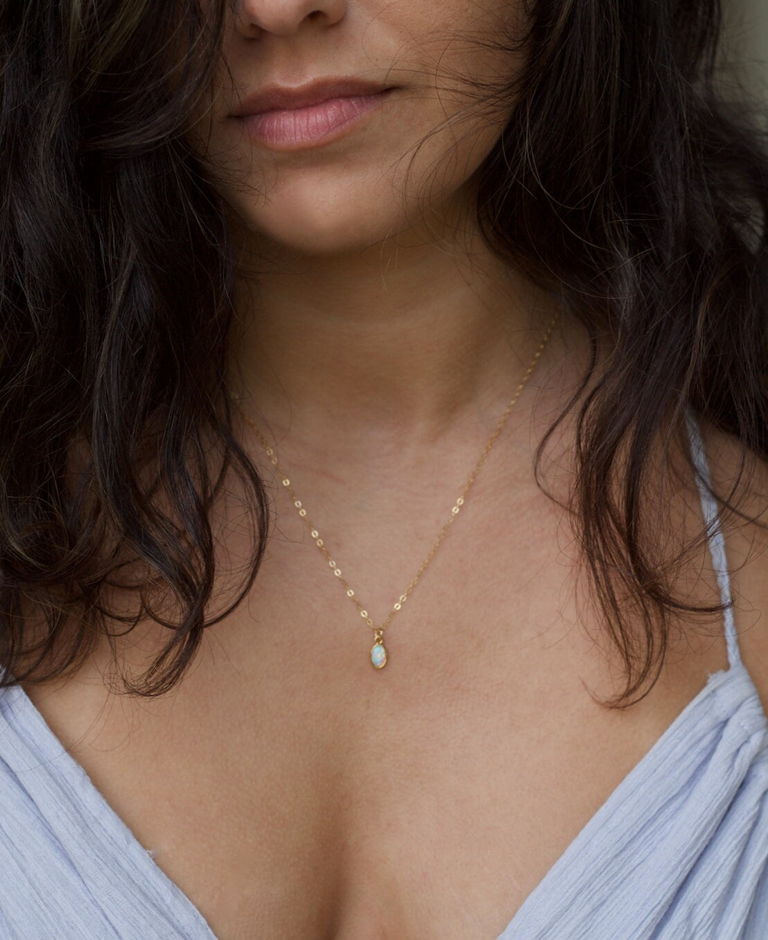 Ultra-tiny white opal necklace available in 14K Gold-Filled or Sterling Silver, featuring a dainty chain for a delicate, feminine touch!

